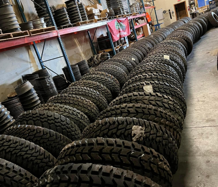 row of new tires for sale